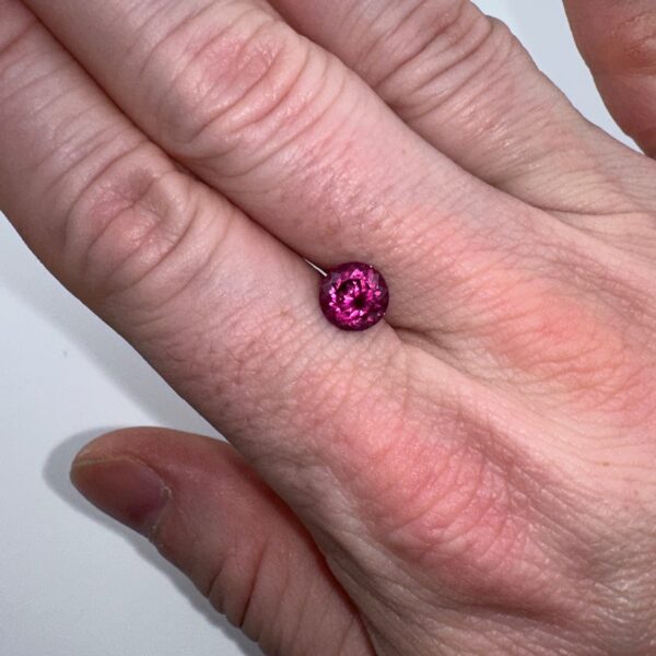 Rhodolite Garnet hand view